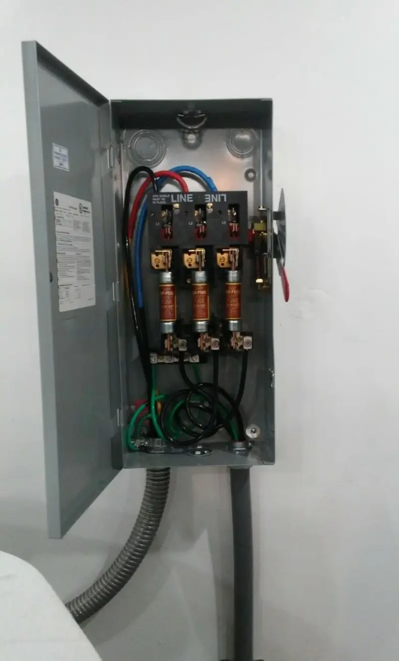 Three-phase disconnect switch installed for Smoke Detector Installation in Seminole