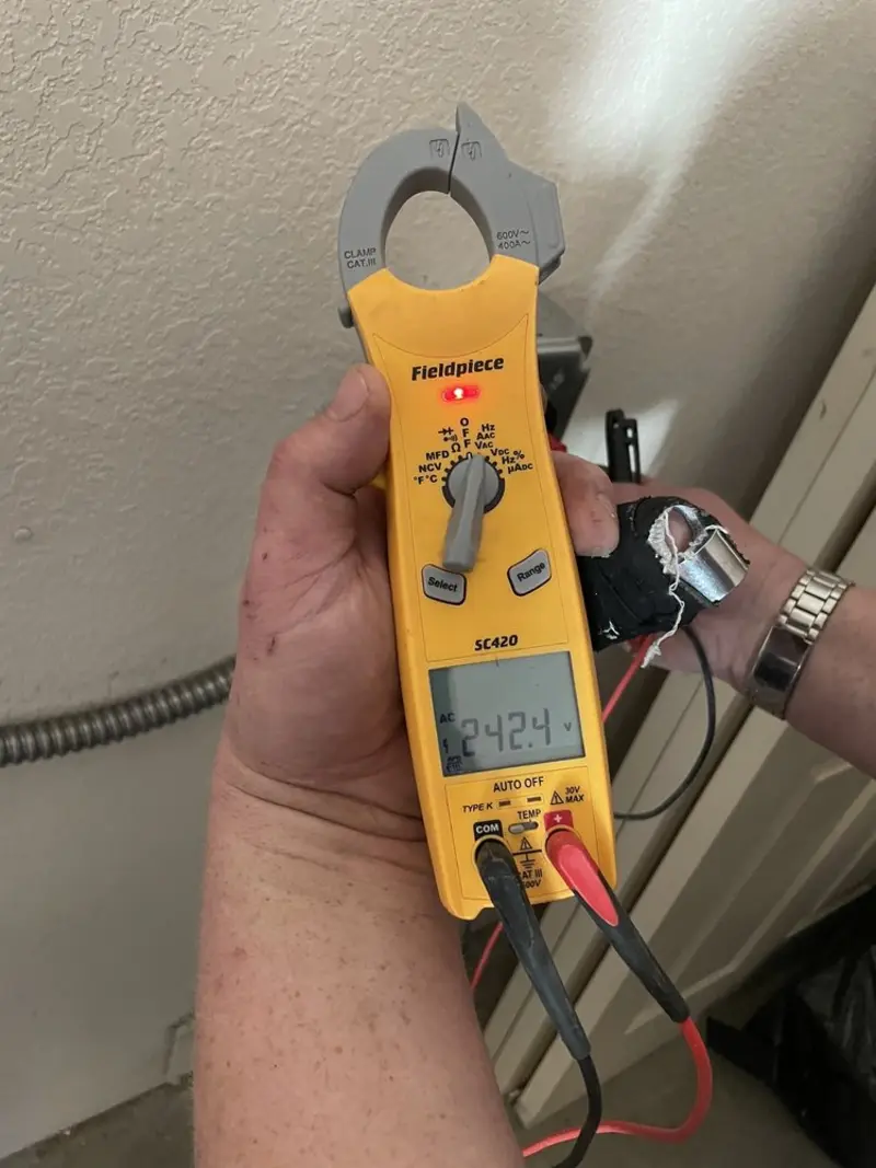 Voltage testing with clamp meter during Hot Tub / Pool Electrical Wiring in Seminole
